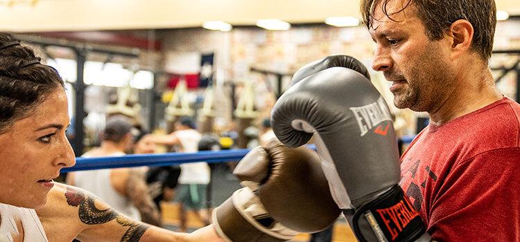 Man & woman boxing